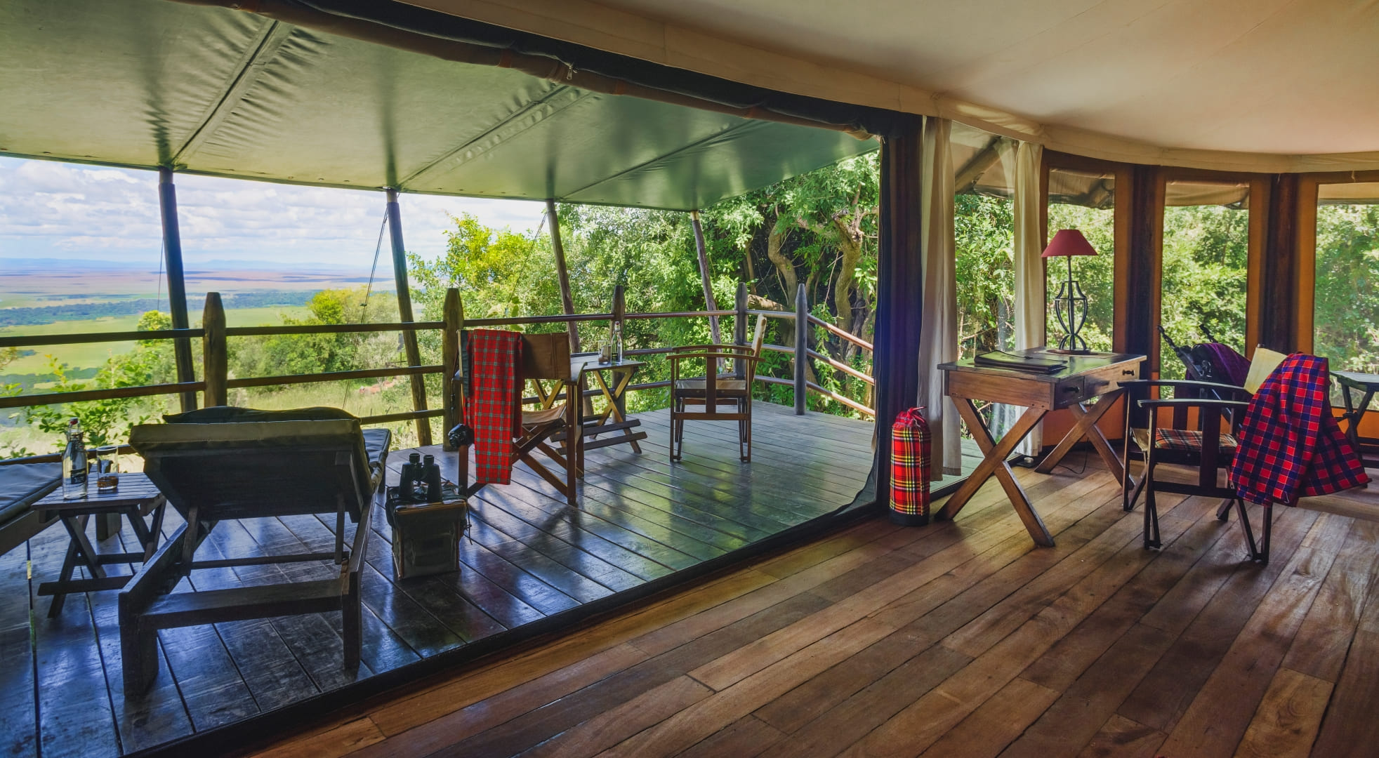 Deluxe tent bedroom at Kilima Camp
